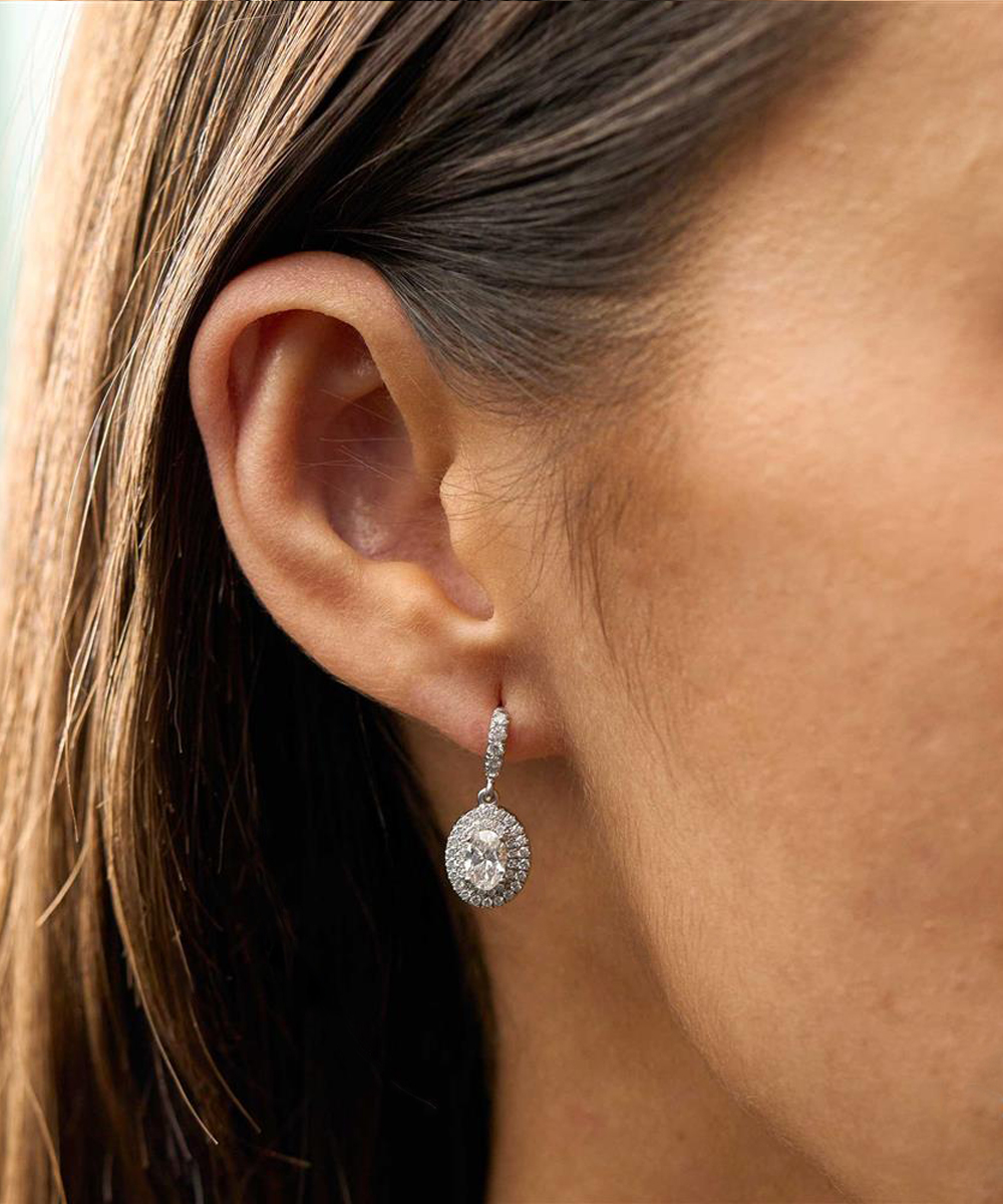 Platinum Oval Cut Diamond Cocktail Earrings with Halos - Modelled